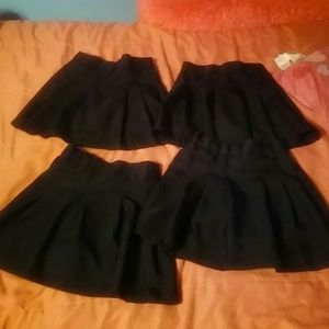 Set of 4 Navy Izod Skorts. Size 8