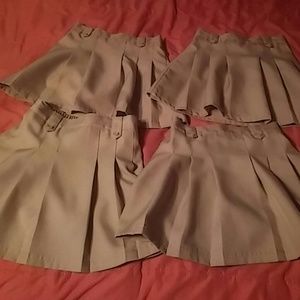 Set of 4 Kakhi uniforms girls skorts. Izod size 8.