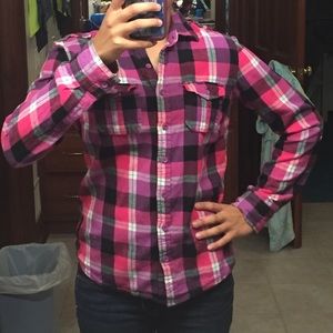 Pink, purple, and black flannel shirt.