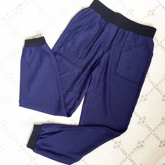 Urban Outfitters Pants - NEW urban outfitters purple printed trousers Urban Outfitters Pants - NEW urban outfitters purple printed trousers