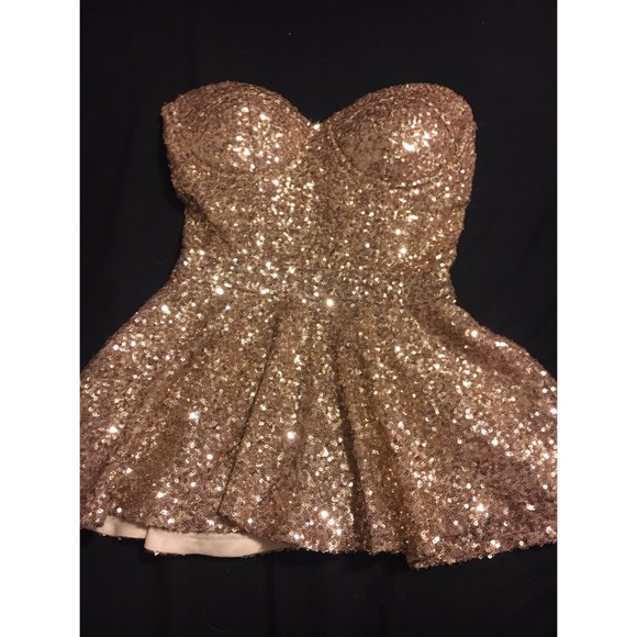 gold strapless top