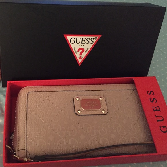Guess light rose wallet/ wristlet. Nwt and box