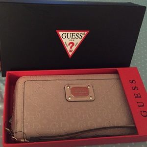 Guess light rose wallet/ wristlet. Nwt and box
