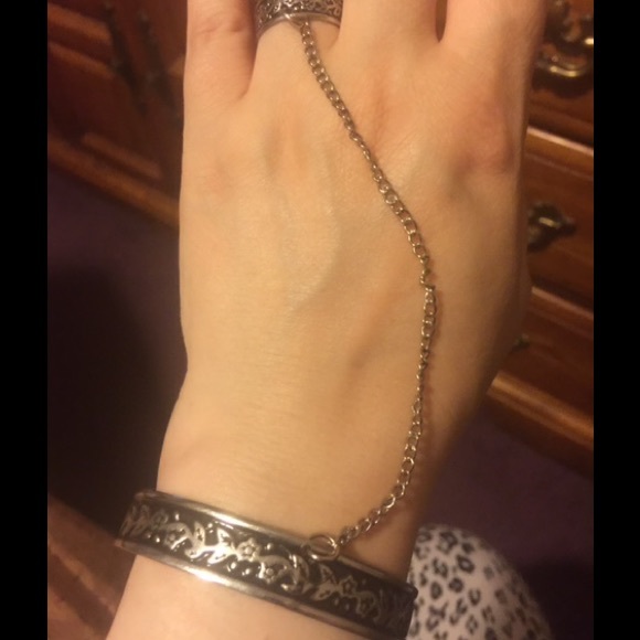 Genuine silver slave bracelet.