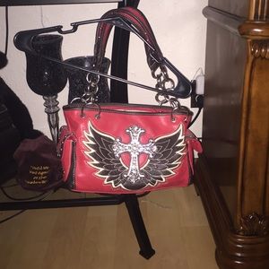 Red purse w/wings & cross