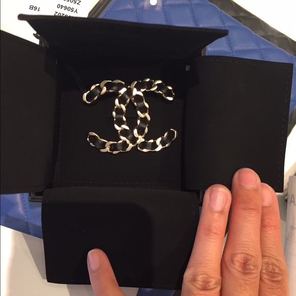 Chanel brooch leather