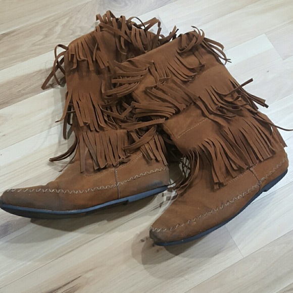 Tall moccasin boots