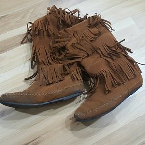 Tall moccasin boots