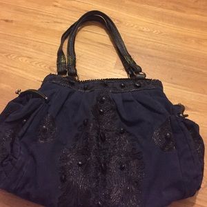 BoHo Anthropologie bag with beautiful detailing.