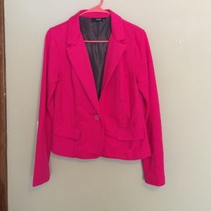 Pink blazer.