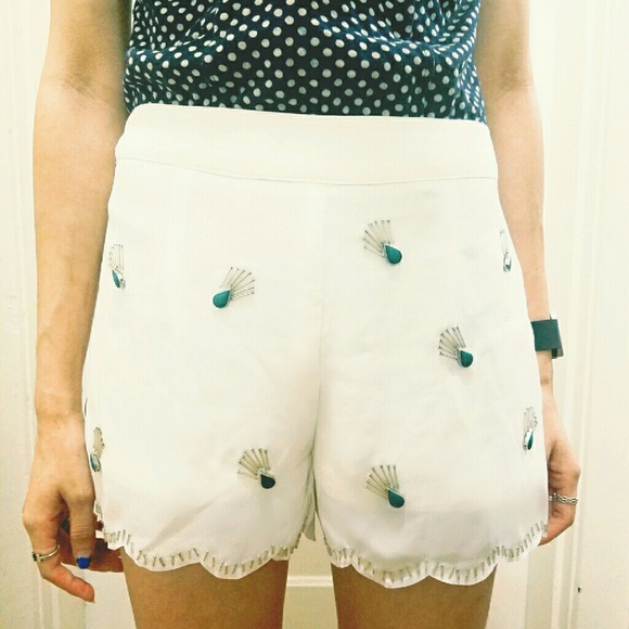 Creme embellished scalloped shorts