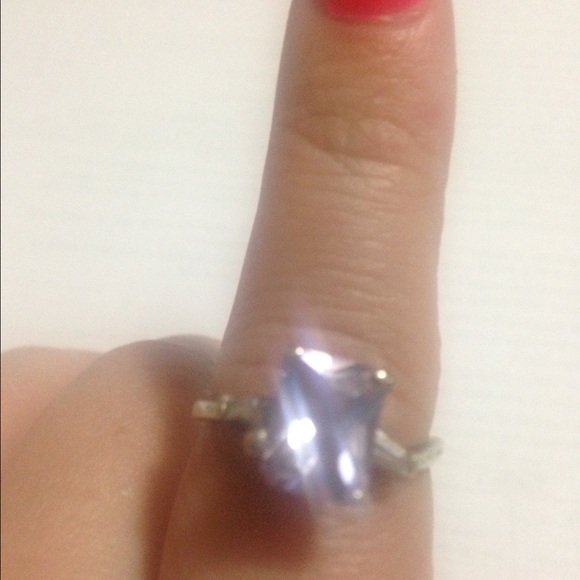 Sterling silver ring with pretty purple stone