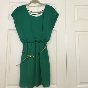 Green dress with gold belt and accents