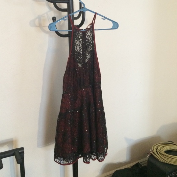 Sleeveless red and black lace dress