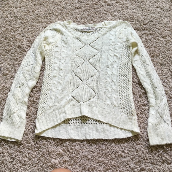 A cream adorable sweater
