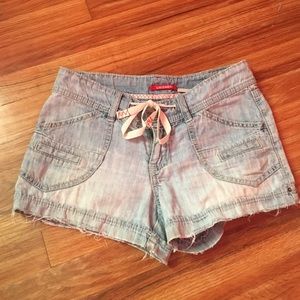 Distressed denim shorts