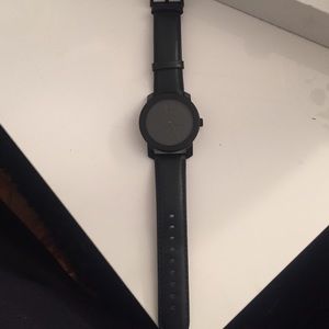 Black movado bold watch with black leather strap