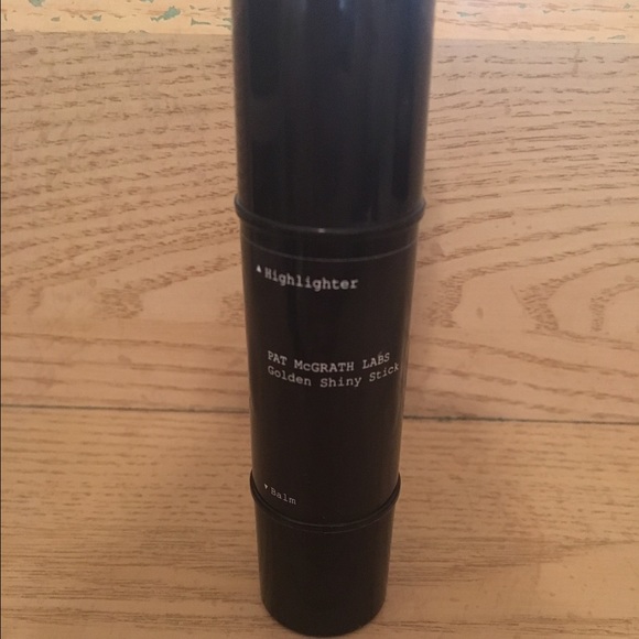 Pat McGrath labs golden shiny stick highlight