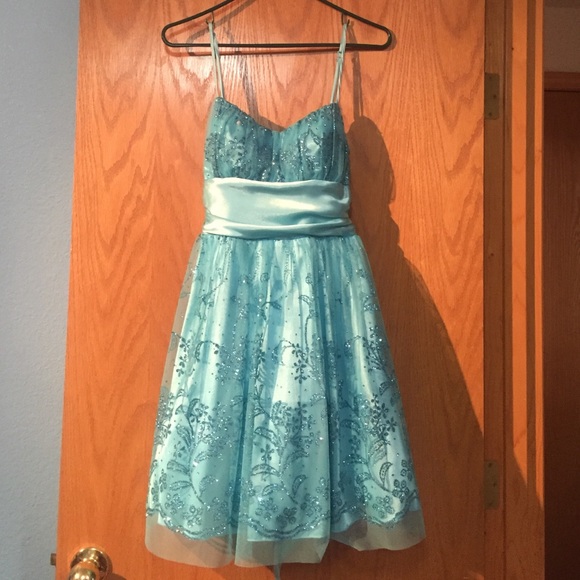 Tea length, sparkly blue dress. - Picture 1 of 4