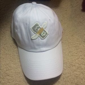 White baseball cap with money emoji