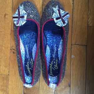 Irregular Choice golden sewing pumps