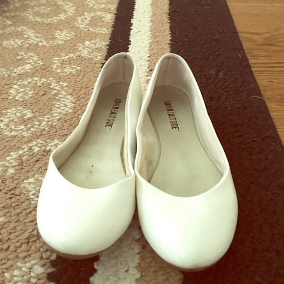 Eggshell white faux leather flats