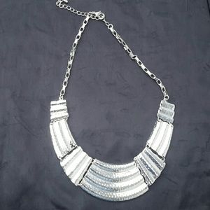 Silver tone adj necklace