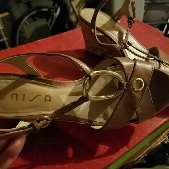 Barely used camel colored low wedge sandals.