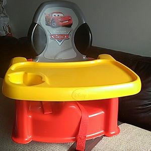 a high chair  tint and baby swing