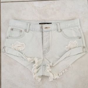 Light wash distressed shorts