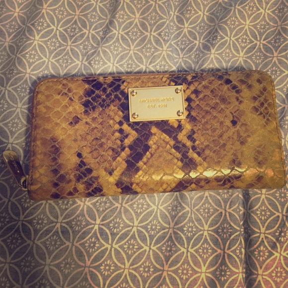 Lightly used Michael Kors snake skin wallet