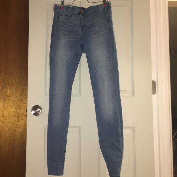 High waisted light blue jeans