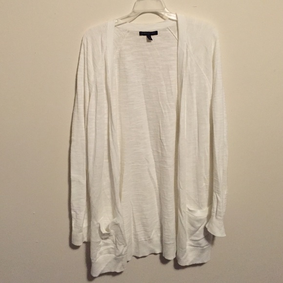 White cardigan.