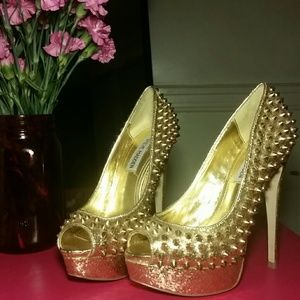 Never worn!! Gold Spiked Heels