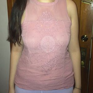 Pink sleeveless blouse