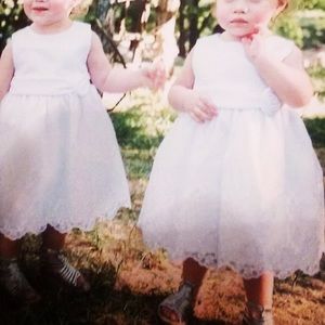 2 flower girl dresses. Size 2T.
