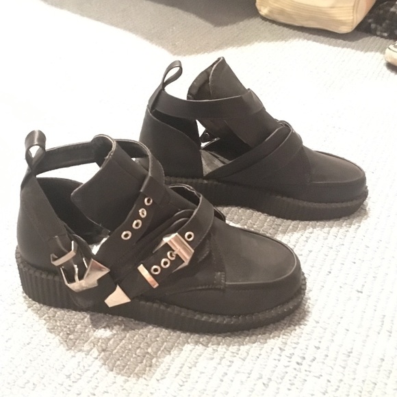 Black leather slip ons