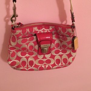 pink and champagne Coach crossbody purse