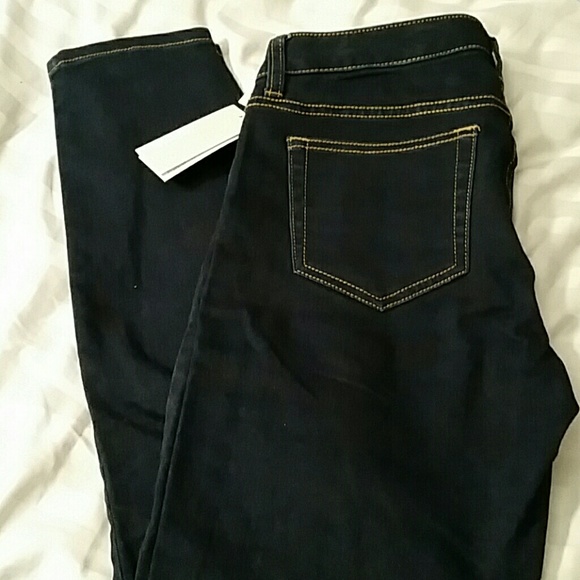 Micheal Kors dark blue jeans