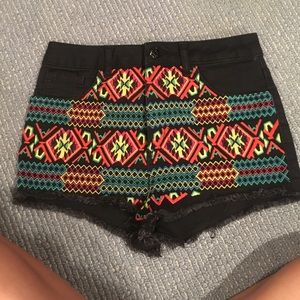 Black shorts with Aztec design