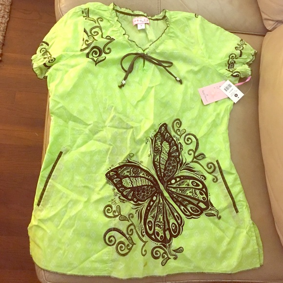 Make an offer! NWT Koi scrub top. Size M