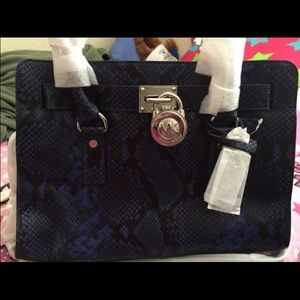 On hold for Jackie! Michael Kors