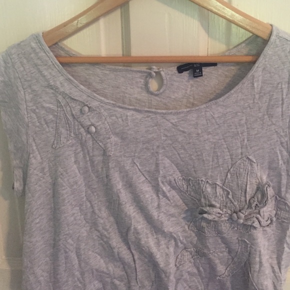 Gray top with flower detailing