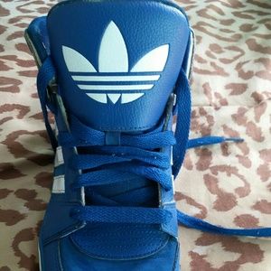 Men's blue and white Adidas high tops