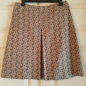 Skirt with a long single pleat.