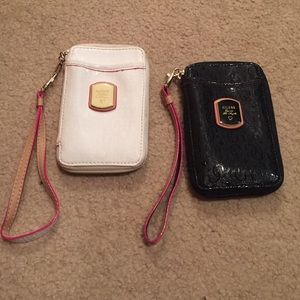 Two clutch/wallets from Guess! White & black