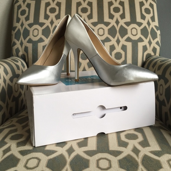 Size 7 heels white and silver brand new with box!