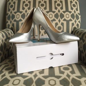 Size 7 heels white and silver brand new with box!