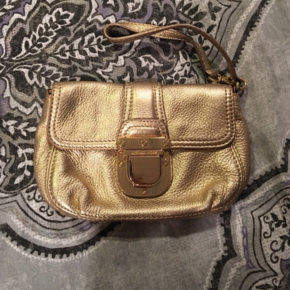 gold Michael Kors wristlet