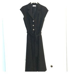 Black Calvin Klein dress. Super flattering